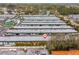 Aerial view of the condo community with a red pin indicating the location of the property at 7816 38Th N Ter # 7816, St Petersburg, FL 33709
