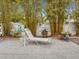 Relaxing backyard with a patio, lounge chair, and decorative bamboo at 7816 38Th N Ter # 7816, St Petersburg, FL 33709