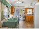 Sunny kitchen area with tile flooring and view to backyard patio at 7816 38Th N Ter # 7816, St Petersburg, FL 33709