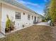 The exterior is landscaped with rocks and desert plants near the back patio at 7816 38Th N Ter # 7816, St Petersburg, FL 33709