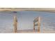 Convenient beach access with stairs leading down to the sandy shore and inviting waters at 830 S Gulfview Blvd # 501, Clearwater Beach, FL 33767