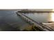 Scenic view of the bridge to Clearwater Beach, with lush landscape on both sides of the roadway at 830 S Gulfview Blvd # 501, Clearwater Beach, FL 33767