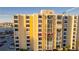 Multi-story condo building boasts a desirable coastal location with many windows and balconies at 830 S Gulfview Blvd # 501, Clearwater Beach, FL 33767