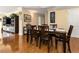 Classic dining area featuring hardwood floors and elegant wooden furniture at 830 S Gulfview Blvd # 501, Clearwater Beach, FL 33767