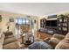 Cozy living room with great view, hardwood flooring, and neutral decor at 830 S Gulfview Blvd # 501, Clearwater Beach, FL 33767