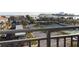Community view from the balcony featuring tennis and shuffleboard courts at 830 S Gulfview Blvd # 501, Clearwater Beach, FL 33767