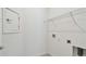 The laundry room has ample shelving for storage at 9412 Coastline Way, Parrish, FL 34219
