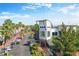 Aerial view of commercial center with palm trees and neatly parked vehicles at 10620 Tavistock Dr, Tampa, FL 33626