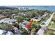 Aerial view of neighborhood and location to Bay with red arrow over property at 1103 Charles St, Clearwater, FL 33755