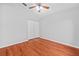 Bright bedroom features wood-look floors, and a closet at 11917 Middlebury Dr, Tampa, FL 33626