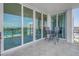 Waterfront balcony with comfortable seating, perfect for relaxing at 1325 Snell Isle Ne Blvd # 611, St Petersburg, FL 33704