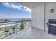 Enjoy the view from this private balcony featuring tile floors and a clear railing overlooking the waterfront at 1325 Snell Isle Ne Blvd # 611, St Petersburg, FL 33704