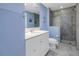 Cozy bathroom with glass enclosed shower, single vanity, and tiled flooring at 1325 Snell Isle Ne Blvd # 611, St Petersburg, FL 33704