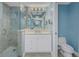 Bathroom featuring glass shower, single vanity with white cabinets, and tile flooring at 1325 Snell Isle Ne Blvd # 611, St Petersburg, FL 33704