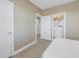 Neutral bedroom features carpet flooring and ensuite bathroom access at 1325 Snell Isle Ne Blvd # 611, St Petersburg, FL 33704