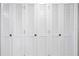 Five paneled bifold closet doors with brass knobs at 1325 Snell Isle Ne Blvd # 611, St Petersburg, FL 33704