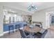 Open-concept kitchen featuring stainless steel appliances and an eat-in dining table at 1325 Snell Isle Ne Blvd # 611, St Petersburg, FL 33704