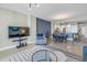 Spacious living room with an open view of the kitchen and dining area at 1325 Snell Isle Ne Blvd # 611, St Petersburg, FL 33704