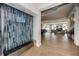 Water feature in a brightly lit lobby with access to the main lounge area at 1325 Snell Isle Ne Blvd # 611, St Petersburg, FL 33704