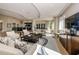 Bright lounge area with comfortable seating, modern decor, and a view of the billiard room at 1325 Snell Isle Ne Blvd # 611, St Petersburg, FL 33704