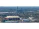 An aerial view of the neighborhood displaying the stadiums, buildings, and serene surroundings at 13385 Arbor Pointe Cir # 203, Tampa, FL 33617