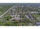 Expansive aerial view of a well-maintained condo community surrounded by lush greenery and trees at 13385 Arbor Pointe Cir # 203, Tampa, FL 33617
