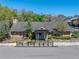 Charming clubhouse with a covered entrance, professional landscaping, and a welcoming exterior at 13385 Arbor Pointe Cir # 203, Tampa, FL 33617