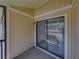 Screened-in patio with sliding glass doors, offering an outdoor living space at 13385 Arbor Pointe Cir # 203, Tampa, FL 33617