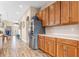 Bright kitchen boasts generous counter space, cabinetry, and a seamless flow to the dining and living areas at 16313 Dinsdale Dr, Spring Hill, FL 34610