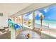 Enclosed balcony features a sitting area with beautiful Gulf views at 17940 Gulf Blvd # 2B, Redington Shores, FL 33708