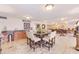 Large gathering space with a kitchenette, dining table, and comfortable seating at 17940 Gulf Blvd # 2B, Redington Shores, FL 33708