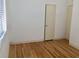 Bedroom featuring wood flooring and a closet at 1800 Pass A Grille Way # 5, St Pete Beach, FL 33706