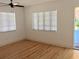 Sunlit bedroom featuring hardwood floors and large windows at 1800 Pass A Grille Way # 5, St Pete Beach, FL 33706