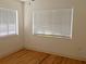 Bedroom with hardwood floors and natural light at 1800 Pass A Grille Way # 5, St Pete Beach, FL 33706