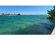 Expansive water view highlighting the serene open waters on a sunny day, with nearby homes in the distance at 1800 Pass A Grille Way # 5, St Pete Beach, FL 33706
