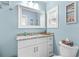 Bathroom featuring granite vanity, decor, and toilet area at 2037 Church Creek Pt, Largo, FL 33774