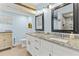 Spacious bathroom with double granite vanity and modern fixtures at 2037 Church Creek Pt, Largo, FL 33774
