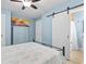 Comfortable bedroom with ensuite bathroom at 2037 Church Creek Pt, Largo, FL 33774