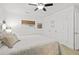Cozy bedroom with a neutral-toned bed and decor at 2037 Church Creek Pt, Largo, FL 33774