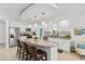 Bright kitchen with a large island, granite countertops, and stainless steel appliances at 2037 Church Creek Pt, Largo, FL 33774