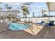 Beautiful pool with a screened in patio area, and brick paver flooring at 2037 Church Creek Pt, Largo, FL 33774