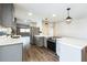 Modern kitchen with stainless steel appliances, sleek countertops, and ample counter space at 2080 Attache Ct, Clearwater, FL 33764
