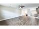 Open-concept living room showcases modern flooring and seamless flow into the kitchen at 2080 Attache Ct, Clearwater, FL 33764
