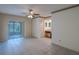 Large bedroom with sliding doors to the sunroom and a built-in vanity at 2847 Rampart Cir, Clearwater, FL 33761