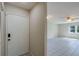 Inviting entryway with tile flooring that leads into a bright living space, complete with a ceiling fan at 2847 Rampart Cir, Clearwater, FL 33761