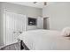 Bedroom with ample closet space, plush carpet and great natural lighting at 31123 Stone Arch Ave, Wesley Chapel, FL 33545