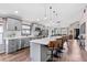 Modern kitchen featuring granite countertops, stainless steel appliances, and hardwood floors at 31123 Stone Arch Ave, Wesley Chapel, FL 33545