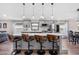 Modern kitchen featuring granite countertops, stainless steel appliances, and hardwood floors at 31123 Stone Arch Ave, Wesley Chapel, FL 33545