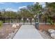 A fenced community dog park provides a secure space for residents and their pets to enjoy outdoor recreation at 3991 Mellon Dr, Odessa, FL 33556