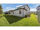 Beautiful home featuring a lush lawn, screened patio and a neutral color palette at 3991 Mellon Dr, Odessa, FL 33556